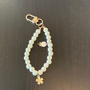 Elegant Pearl Bracelet with Flower Charm